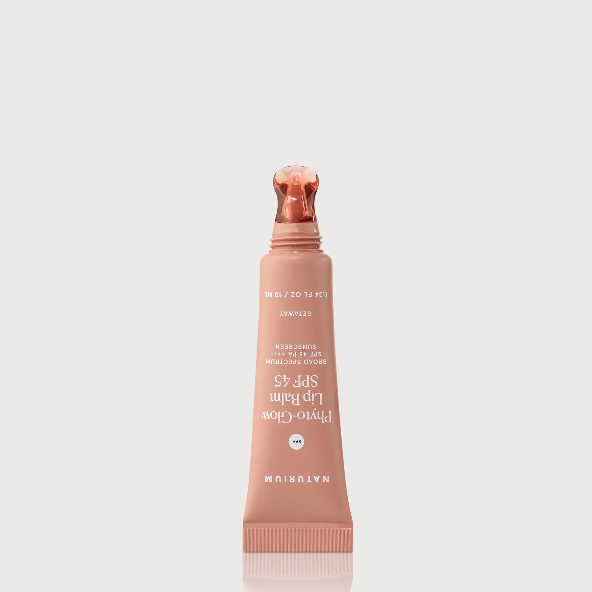 phyto-glow-lip-balm-spf-45-getaway-e1 NATR-10126_PhytoGlow_SPF_Getaway_primary_nocap_bonebkgd_1.webp