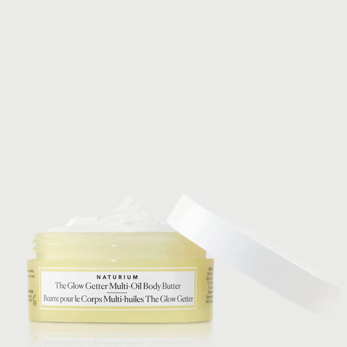 the-glow-getter-multi-oil-body-butter-travel-size-p3 NATR-40115_Glow-Getter-Body-Butter-Mini_front_capoff_bonebkgd.webp